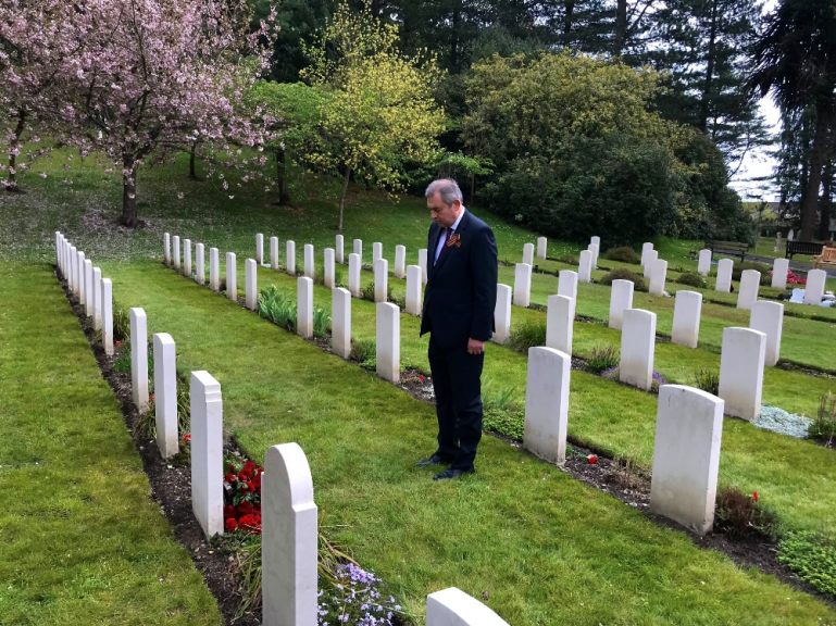 On Victory Day Ambassador Andrei Kelin laid flowers at the grave of the Soviet soldier at the Aldershot Military Cemetery