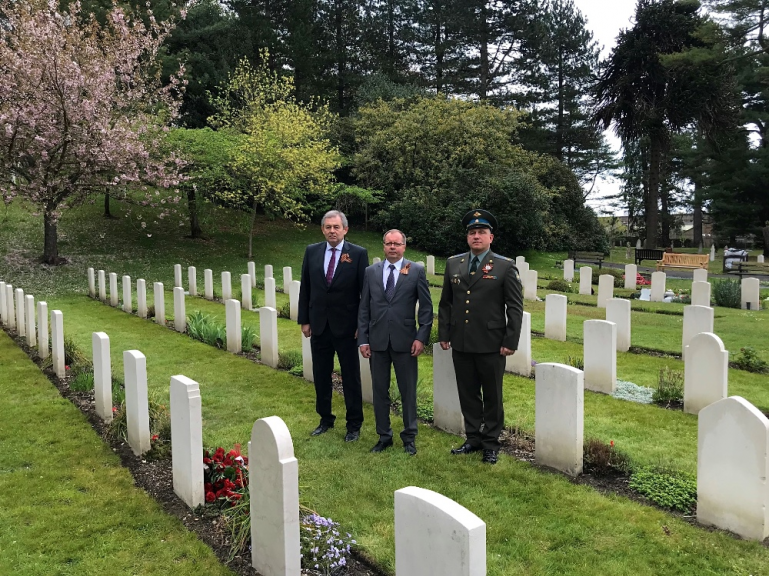 On Victory Day Ambassador Andrei Kelin laid flowers at the grave of the Soviet soldier at the Aldershot Military Cemetery
